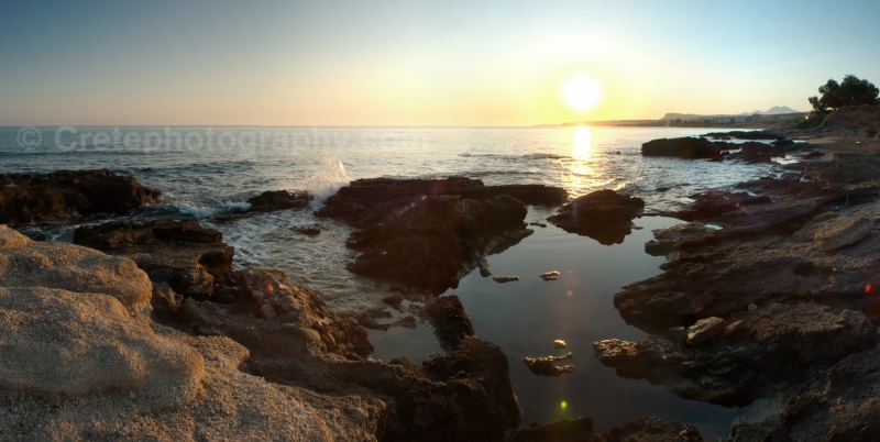 Sunrise over the Cretan Sea and rocks